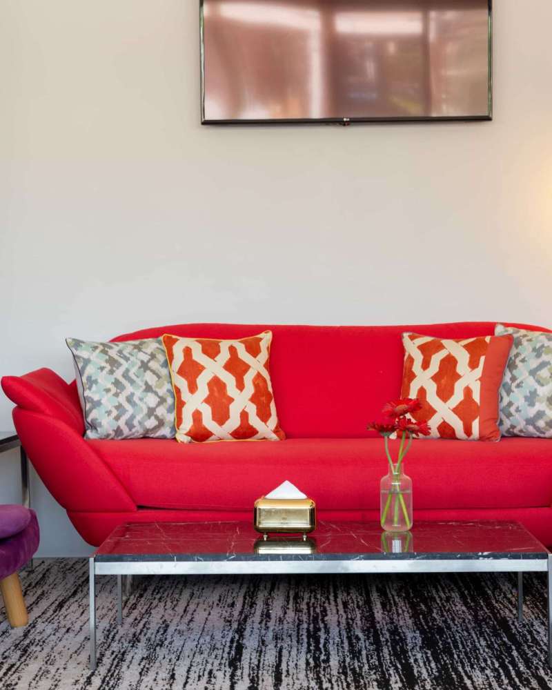 Red Couch in the gameroom